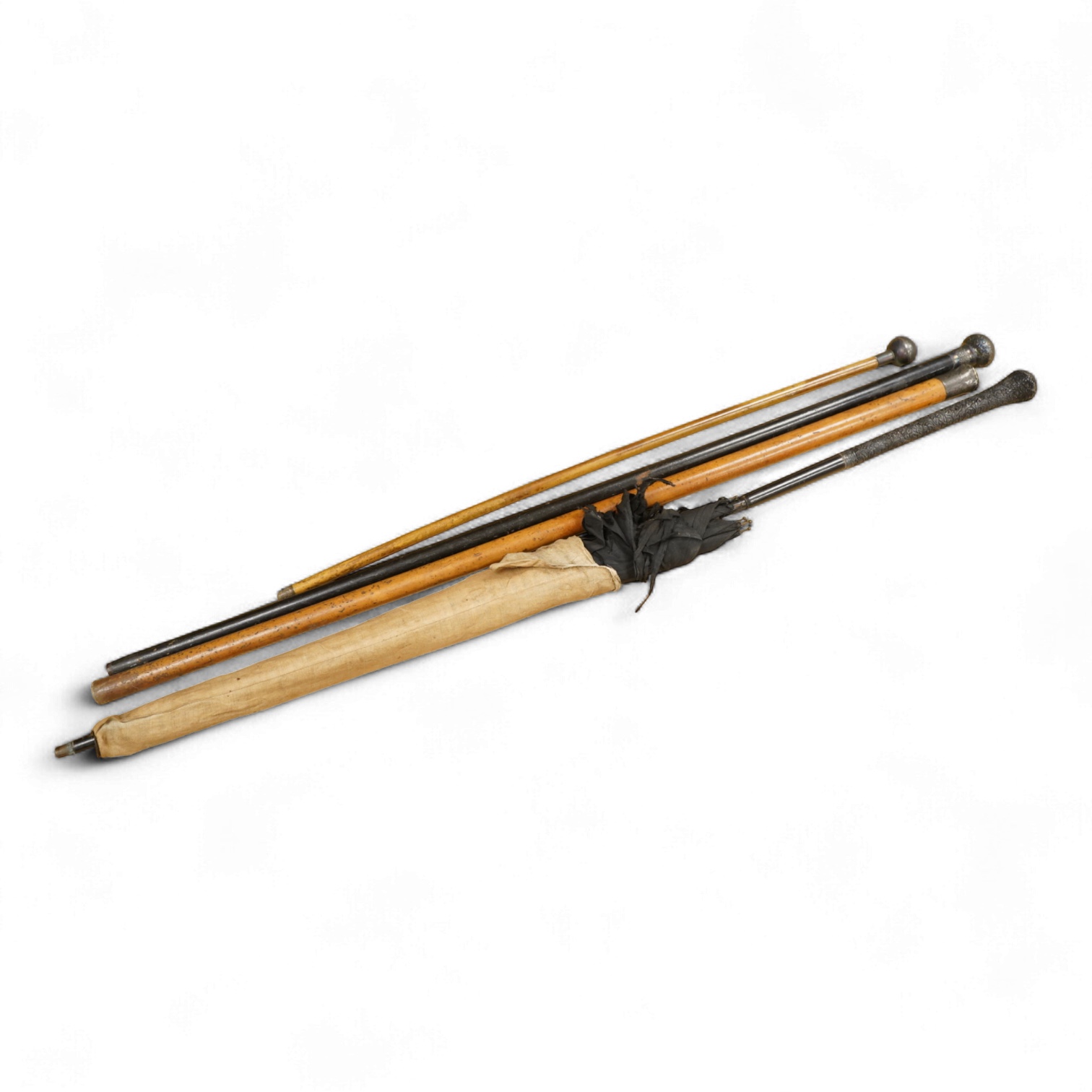 Three silver topped walking canes and a similar parasol, largest 97cm in length